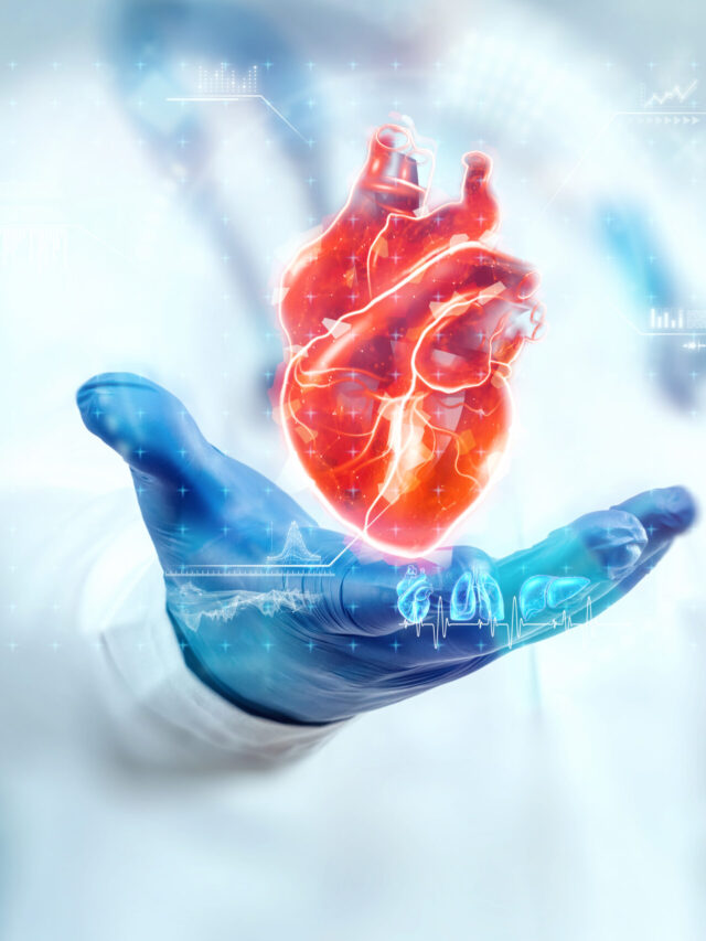 The doctor looks at the Heart hologram, checks the test result on the virtual interface, and analyzes the data. Heart disease, myocardial infarction, innovative technologies, medicine of the future.